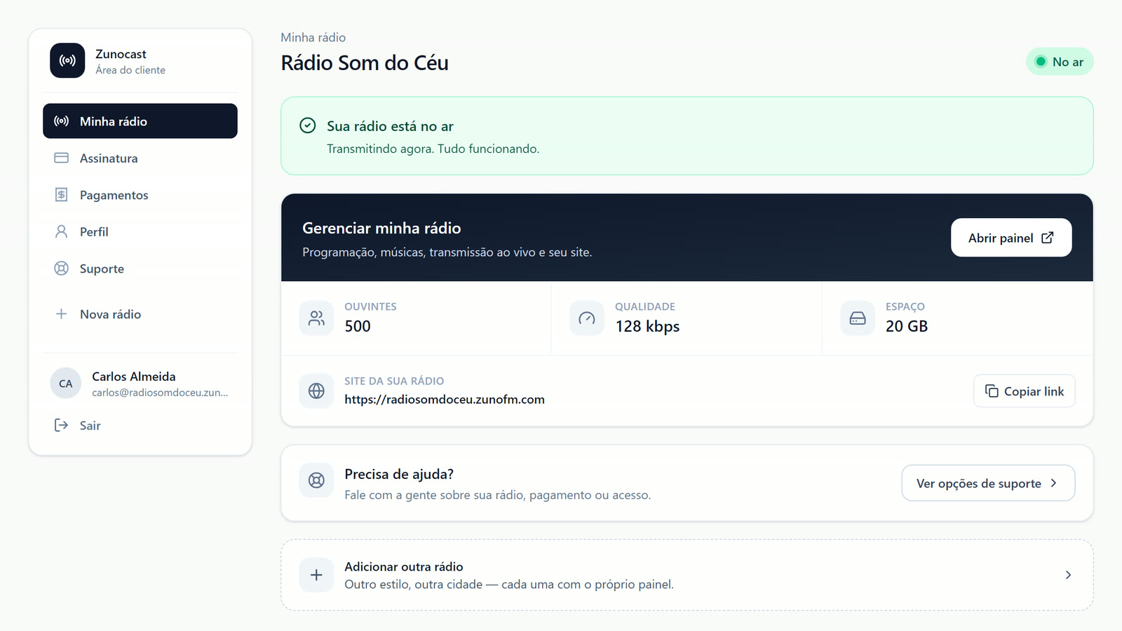 Área do cliente da Zunocast: a rádio Som do Céu com o aviso Sua rádio está no ar, o botão Abrir painel, ouvintes, qualidade, espaço e o link do site